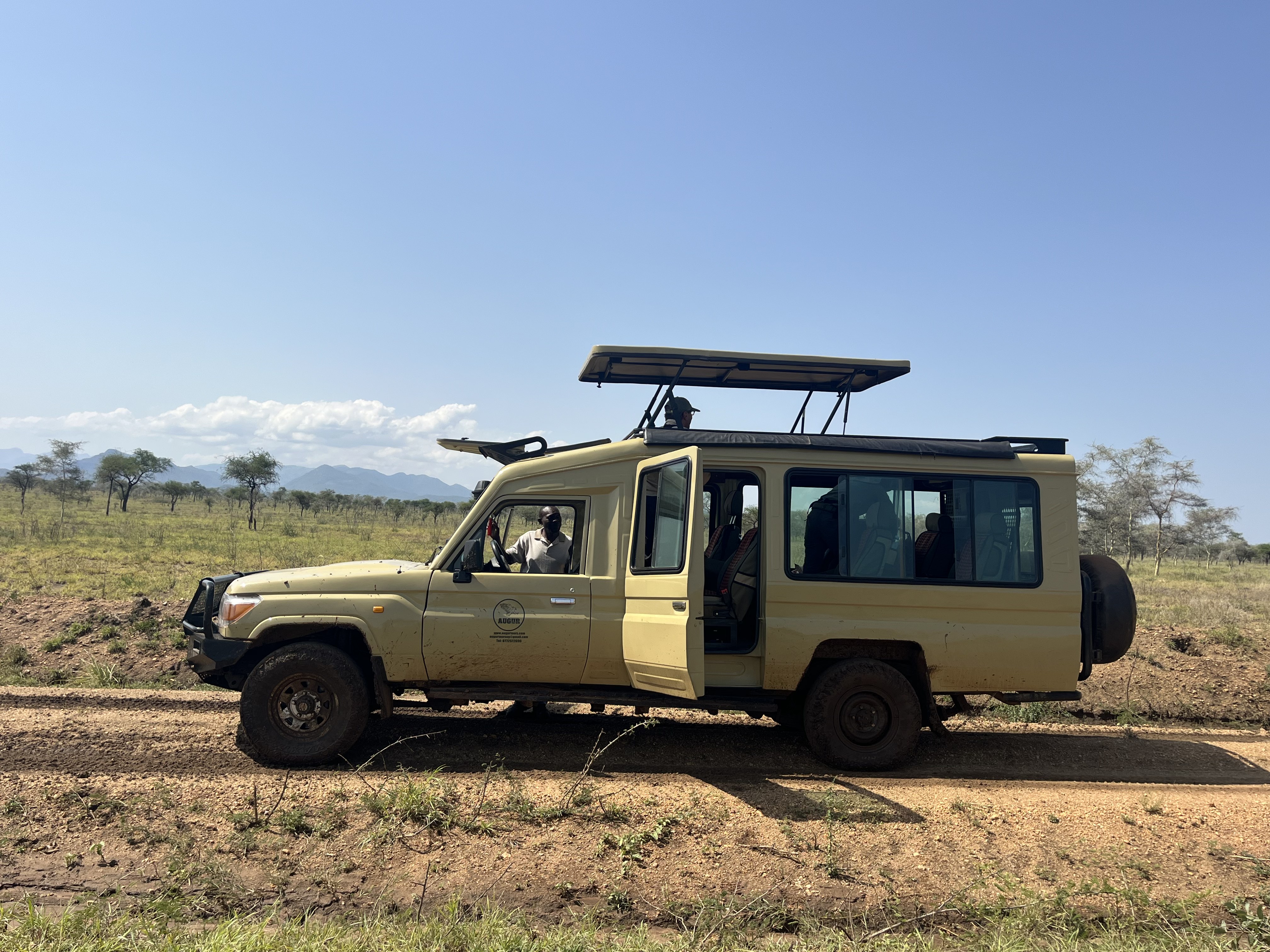 Augur Tours safari vehicle in a Ugandan national park