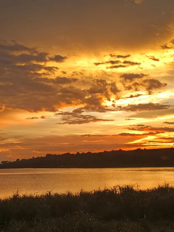 Golden sunset over a calm lake